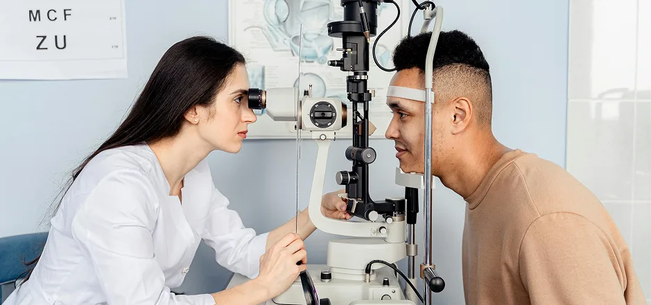 Optometrist carrying out an eye examination