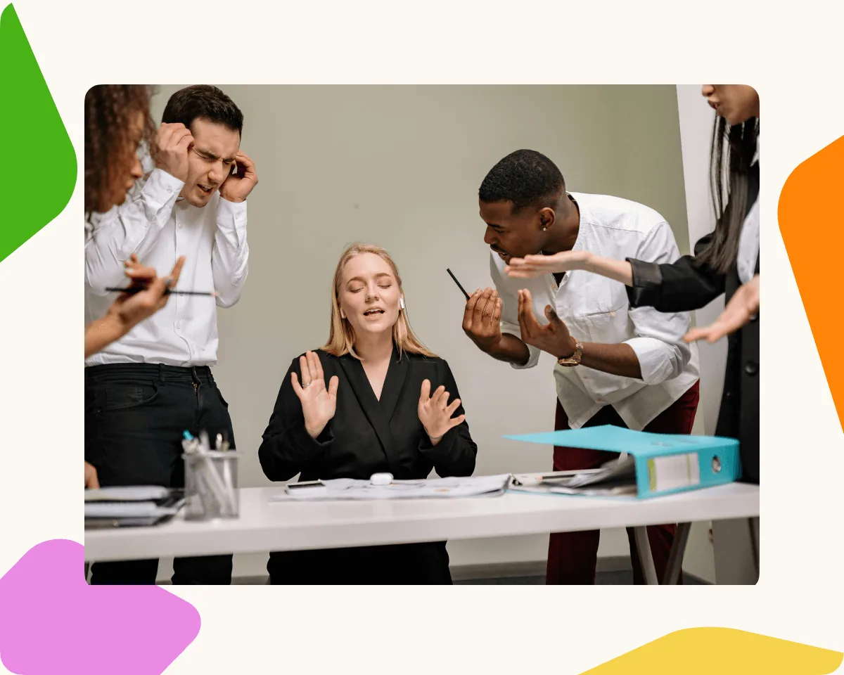 HR team overwhelmed by paperwork at a desk